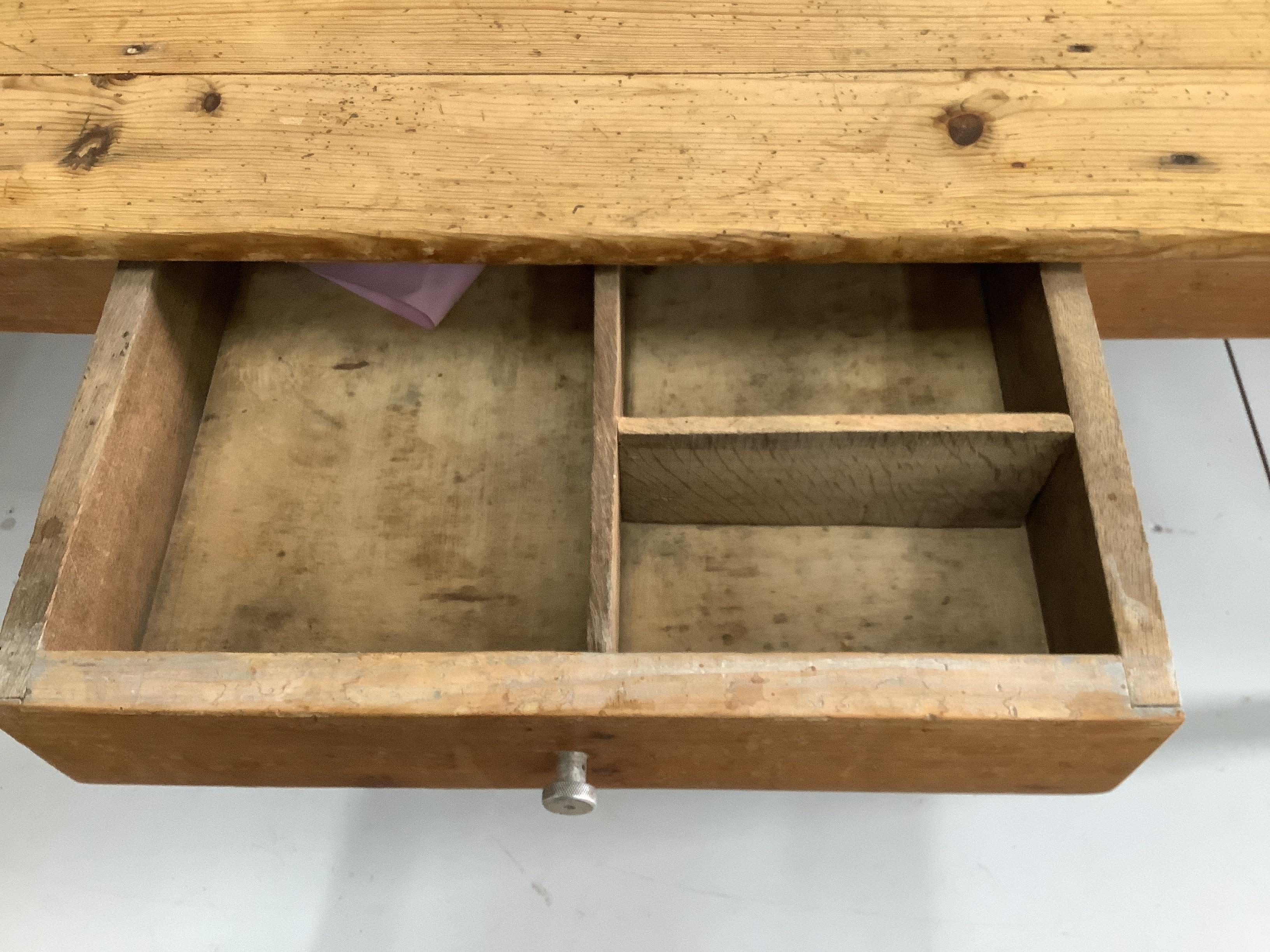 A 19th century French rectangular pine kitchen table, length 192cm, width 90cm, height 74cm